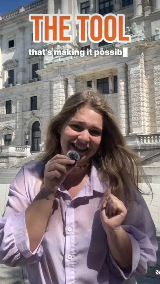 A creator outside a Vienna palace, captioned “the tool that’s making it possible”.